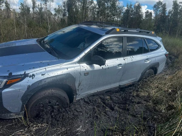 “Took my new Subaru off-road, got stuck in the mud miles from the road.”
