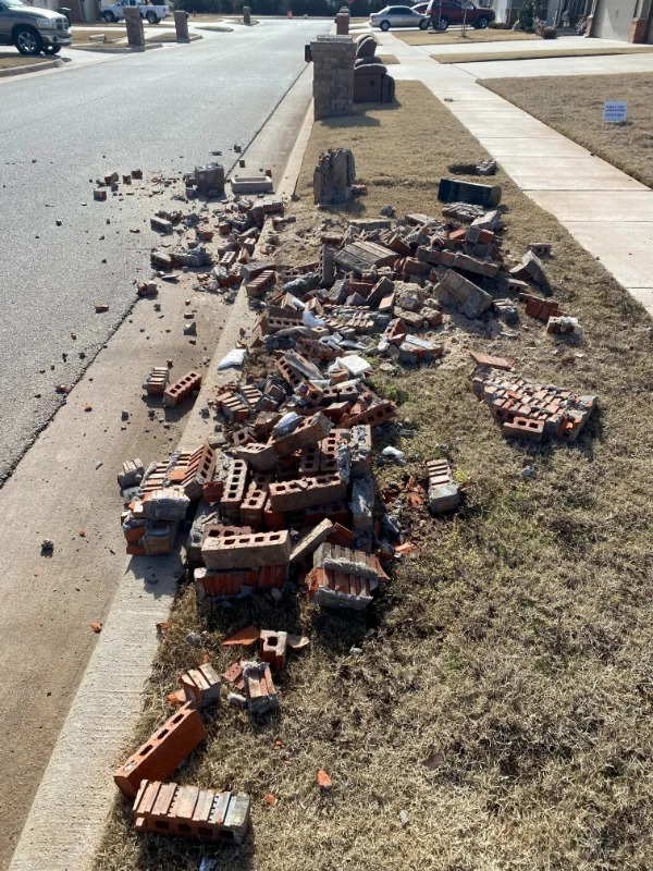 “Happy New Year to us. Someone smashed our brick mailbox.”