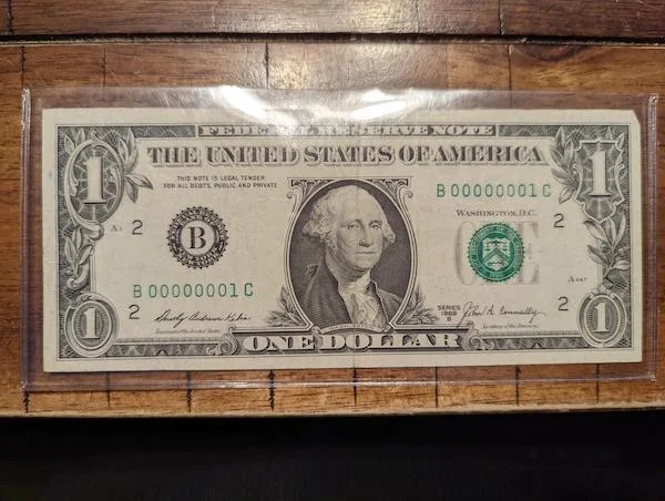 This 1969 dollar bill we found in my Dad’s small money collection with a 00000001 serial number
