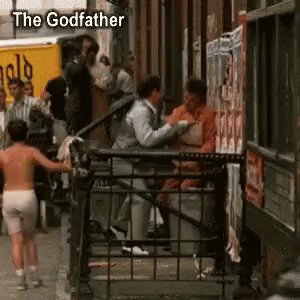 movie mistakes - james caan godfather gif - The Godfather