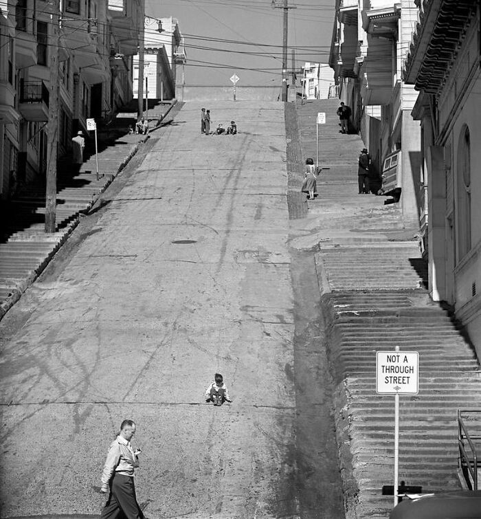 Boys Sidewalk Sledding On a Steep San Francisco Hill Street, 1952.