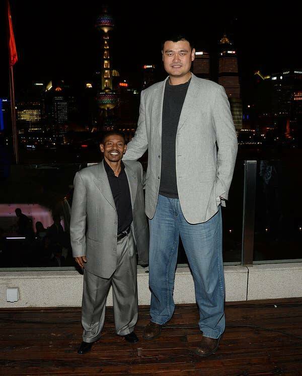 The man on the left, Muggsy Bogues, played in the NBA almost twice as long as the man on the right, Yao Ming: Both legends in their own right, Muggsy played for 14 years, while Yao played for eight seasons.