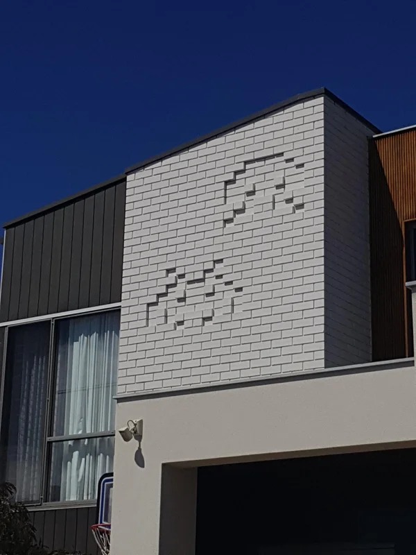 Space invaders was bricked into the exterior wall of this house.