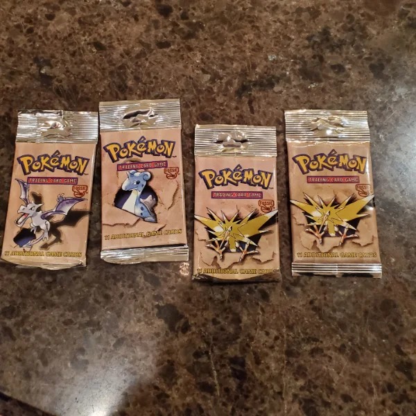 “Found 4 unopened packs of Pokemon cards from 1999.”