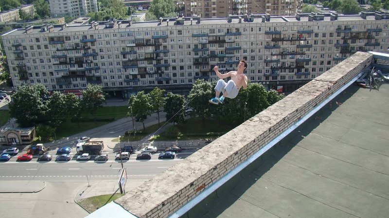 Russian freerunner Pavel Kashin during a backflip off the edge of a 16-story building.
Kashin decided to stand on a ledge that was just three feet wide on a rooftop that was 16 floors above the ground. His friends, Vladimir Lapik and Sasha Bitkov, were filming the stunt. After doing the backflip, Kashin struggled with the landing, losing his footing and falling from the roof and to his death on the ground below.