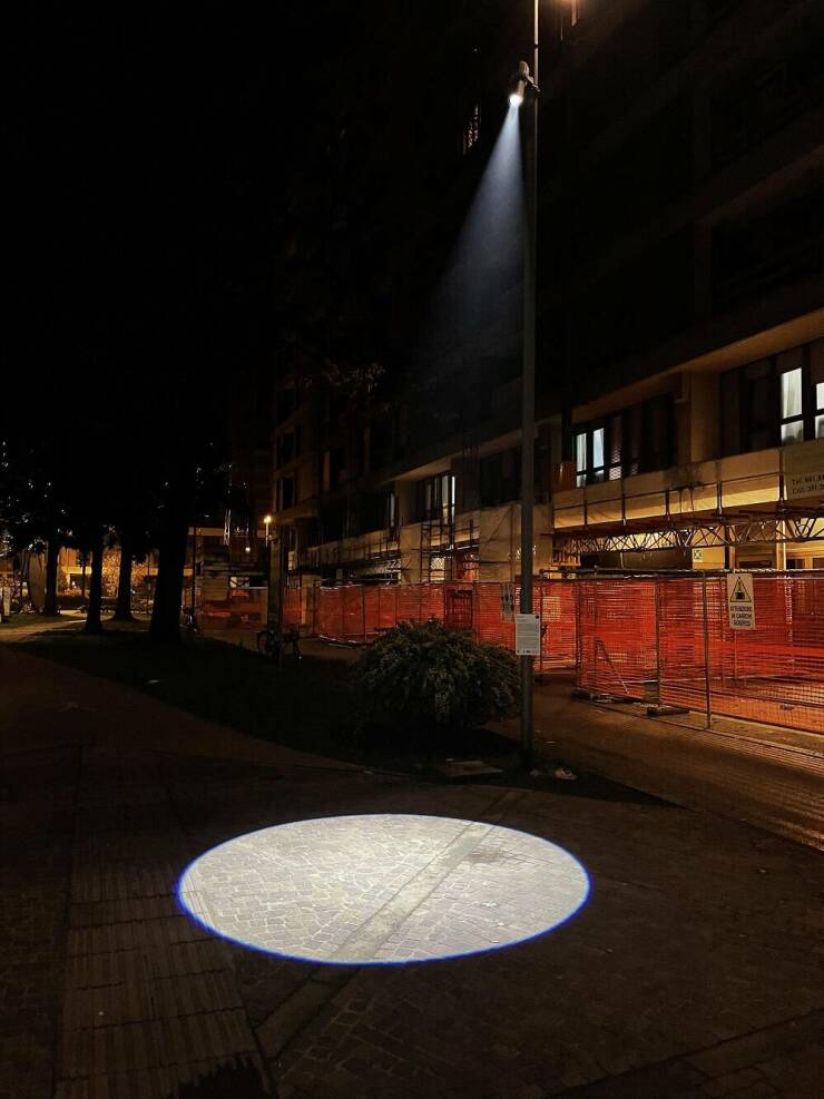 “This randomly illuminated patch of street.”