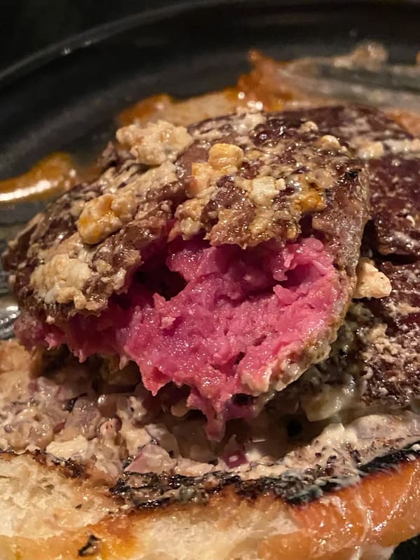 “Friend was served this burger last night. Waitress physically recoiled when we showed her. I’m not a burger expert but that seems a little too pink.”