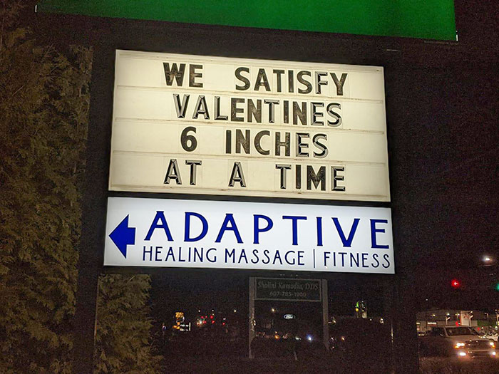 Valentine's Day fails - street sign - We Satisfy Valentines 6 Inches At A Time Adaptive Healing Massage Fitness Sholini Kamodix Dds 6077851900