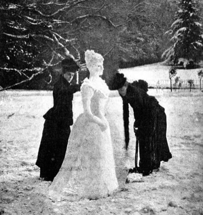 Two Ladies Making A Snow Lady. This Photo Was Originally Printed In Strand Magazine, Volume III 1892