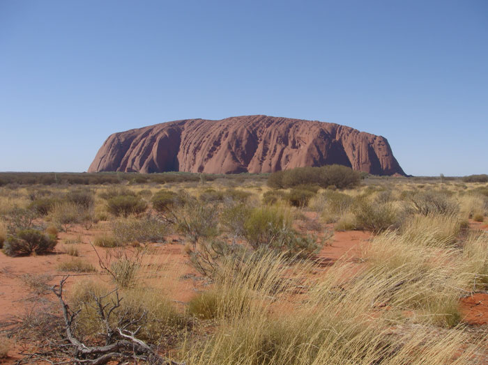 Rocks! They are everywhere, but Australia probably has the largest ones. At a height of 2,831 feet (863 meters) above sea level, Uluru/Ayers Rock stands 1,142 feet (348 meters) over the surrounding desert plain. Explorer Ernest Giles initially noticed the rock in 1872. Surveyor William Gosse was the first European to visit it the following year.