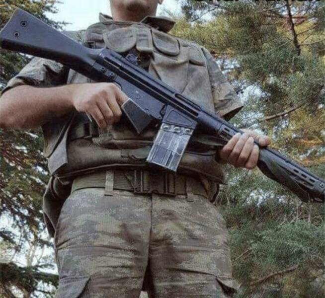 "Anti suicide trigger guards on Turkish military rifles"