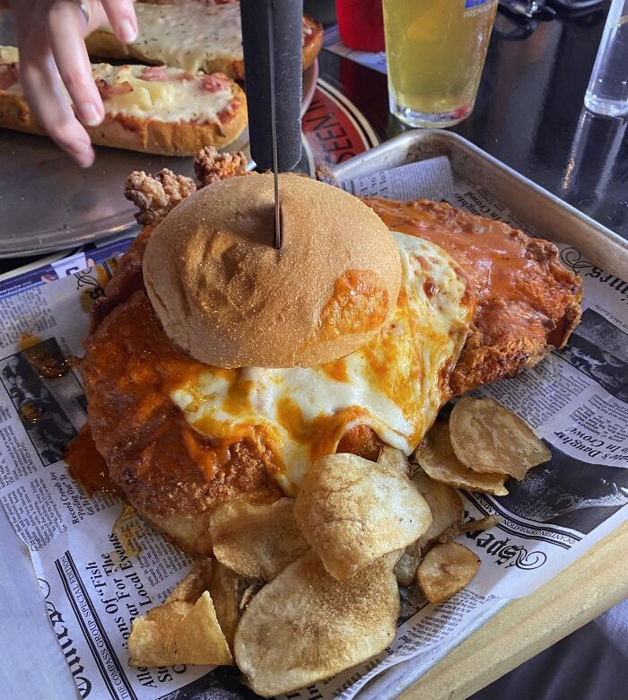 A Chicken Sandwich I Ordered That Was Impossible To Eat Normally. Didn't Expect The Size (Had More Chips On The Side)