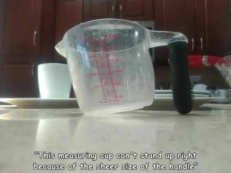 funny fails and facepalm pics - glass - "This measuring cup can't stand up right because of the sheer size of the handle"