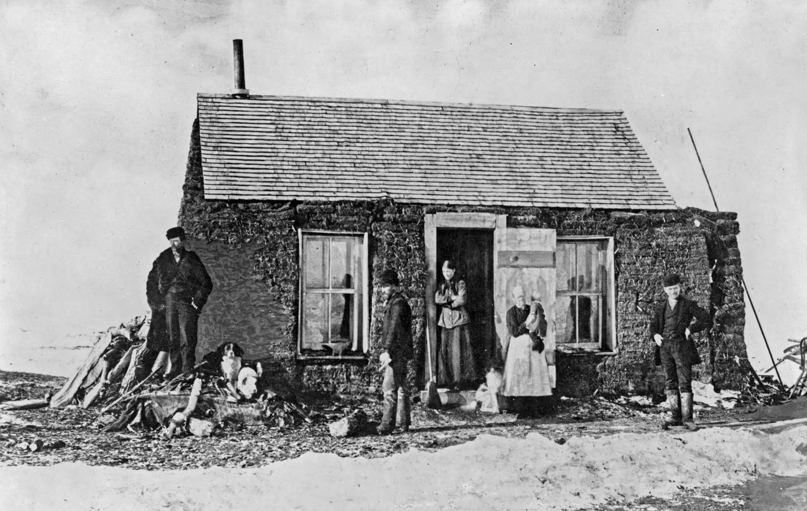 Settlers outside their sod home in Aberdeen, S.D., 1892