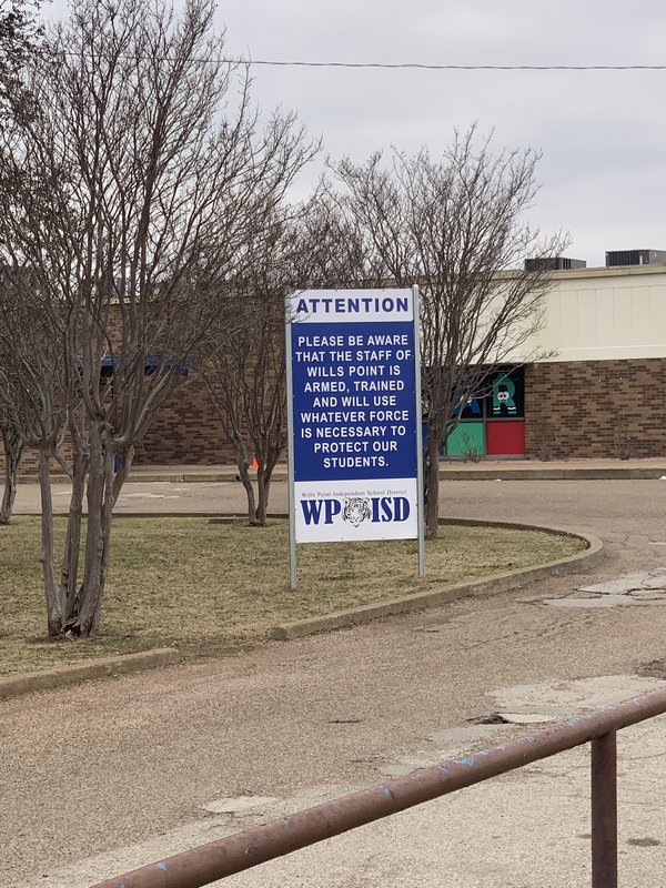 fascinating photos - wills point elementary school gun sign - Attention Please Be Aware That The Staff Of Wills Point Is Armed, Trained And Will Use Whatever Force Is Necessary To Protect Our Students. Will Point Independent School Dict Wpoisd