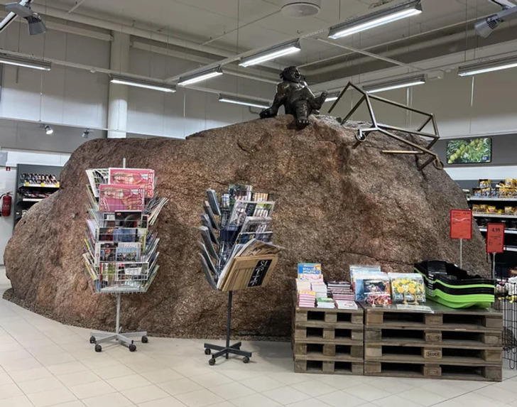 “This grocery store in Estonia has a giant rock inside.”