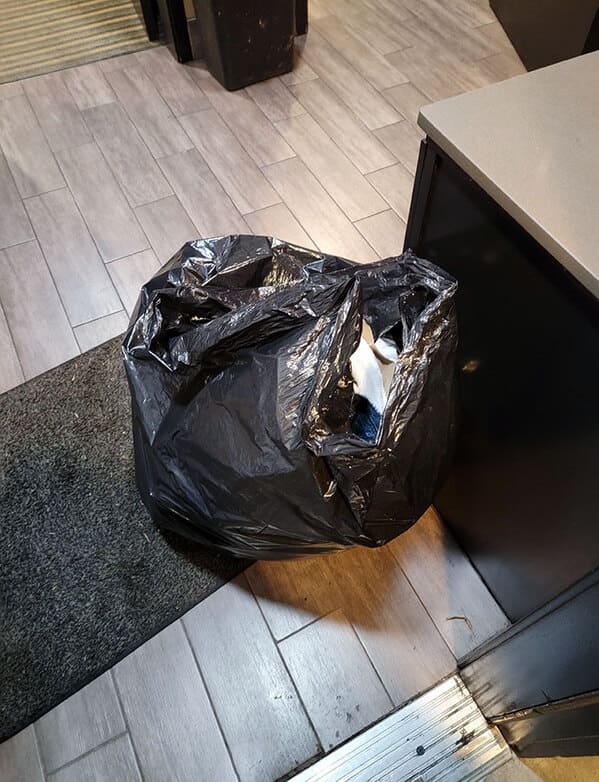 “I Got Back To The Hotel After Working 12 Hours And Found That The Staff Had Put All Of Our Stuff Into A Trash Bag And Gave Our Room Away”