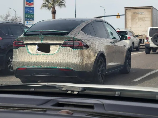 This car covered in nickels