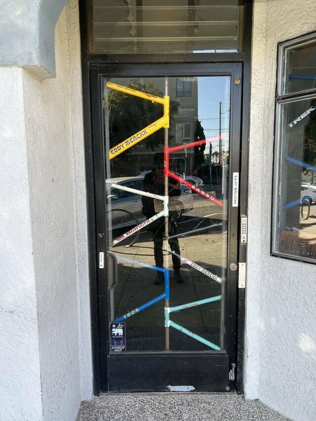 "This bike shop used old bike frames to make security window bars."