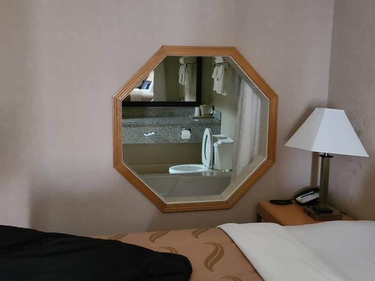 "A hotel room (it’s not a mirror)"