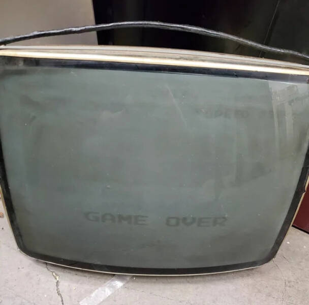 “A broken tube TV at my work has ‘GAME OVER’ burnt into the screen.”