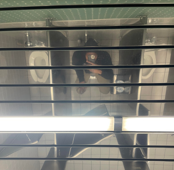 “This mirrored ceiling in our bathroom at work”