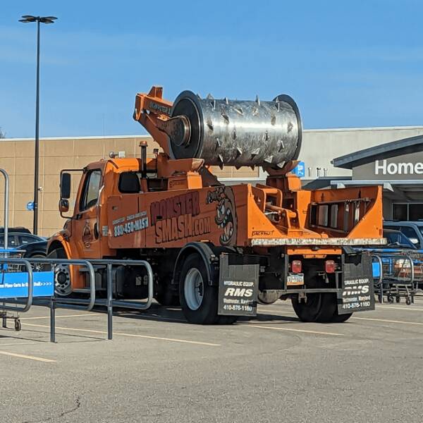 "Found a demolition truck with a huge spiked roller as a tool"