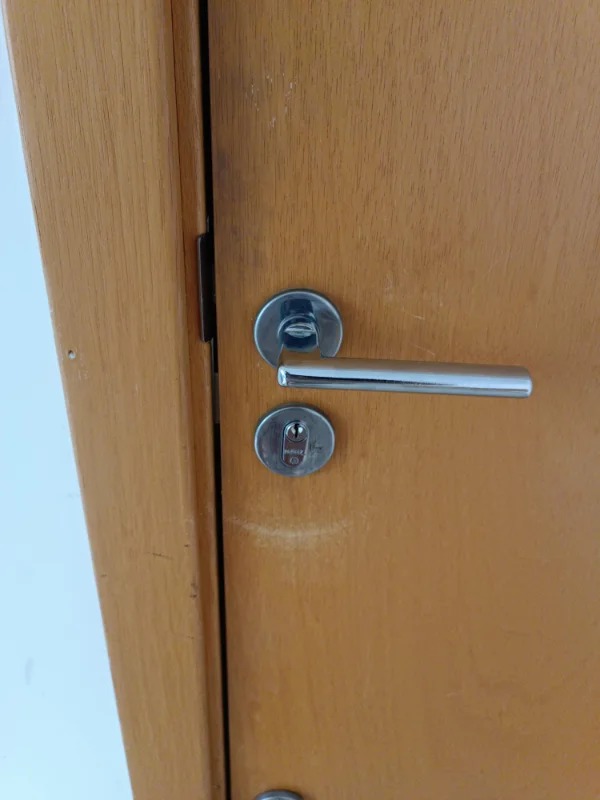 “This is the inside of my apartment door. Roomie left with my keys and it cannot be unlocked from the inside without a key.”