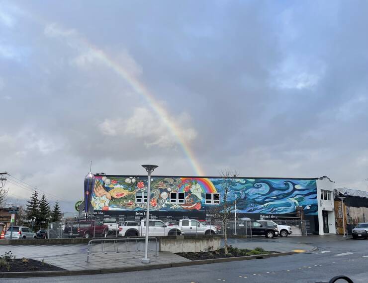 "This rainbow appeared and intersected with the mural rainbow just as I was walking by."