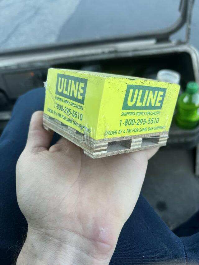 "This miniature pallet of sticky notes"