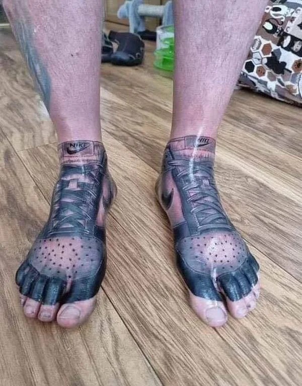 wtf pics - jordans tattooed on feet - Nike Vike