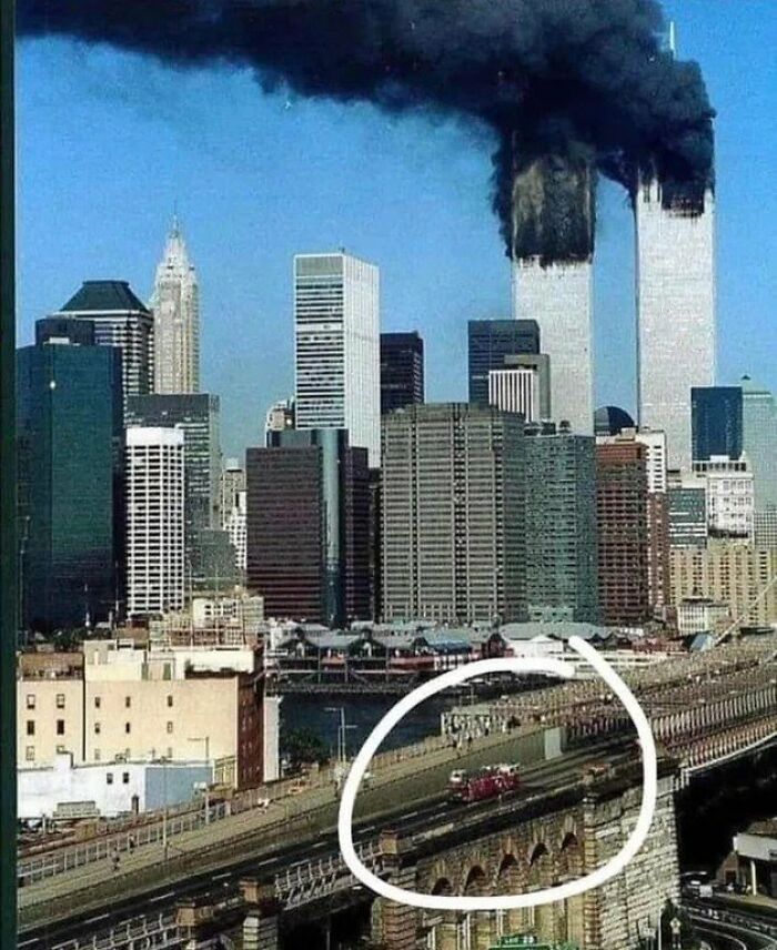 Ladder 118 Fire Truck Crossing The Brooklyn Bridge To The World Trade Center On September 11, 2001. Every Firefighter On The Truck Died Shortly After