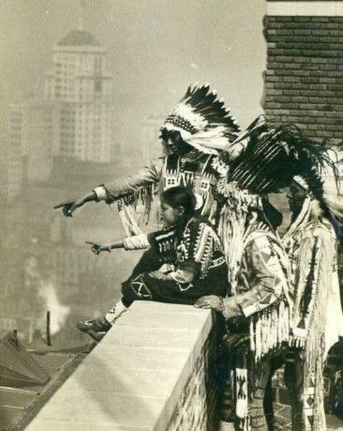 fascinating historical photos - blackfoot indians on the roof of the mcalpin hotel, refusing to sleep in their rooms, new york city (b/w photo) - www.