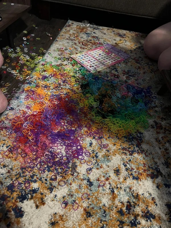 “My gf was making bracelets for an upcoming concert,and the cat knocked all the rubber bands off the table.”