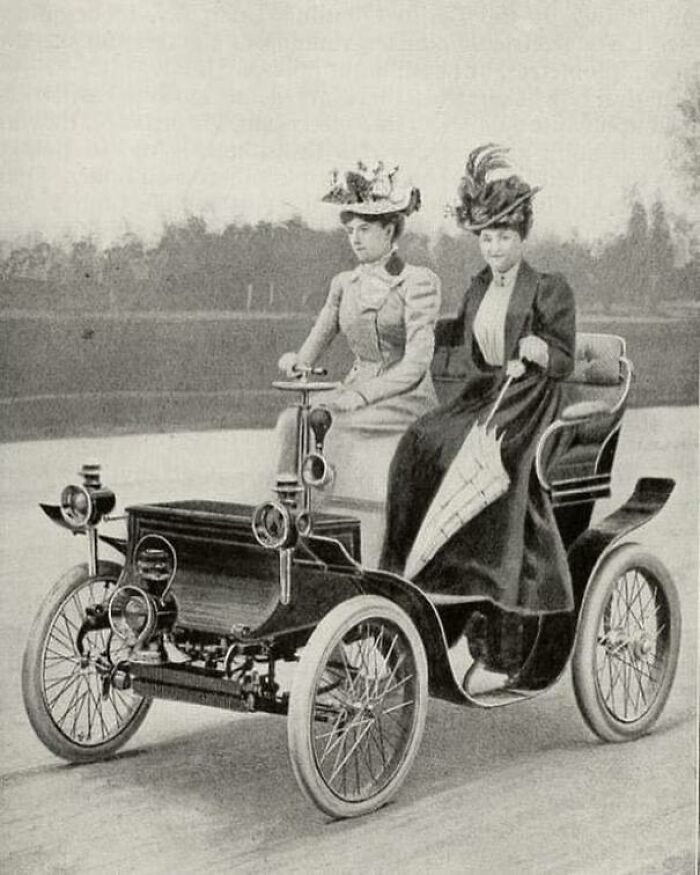 Two Ladies Ride In An Early Car Model, 1900