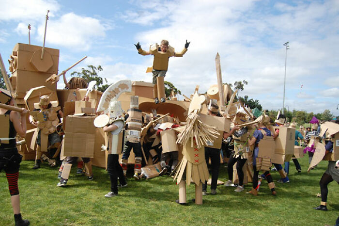 Box Wars is an Australian event series where people build elaborate cardboard suits of armour, get together at a festival ground and then have an epic battle. The event was started in 2002. There are 4 rules during a battle. 1. There are no winners, only losers. 2. Use common sense during a battle. 3. Only recycled carboard allowed. 4. After the battle, kids plunder the battlefield. And if a kid asks you for your armor, you must give it to them.