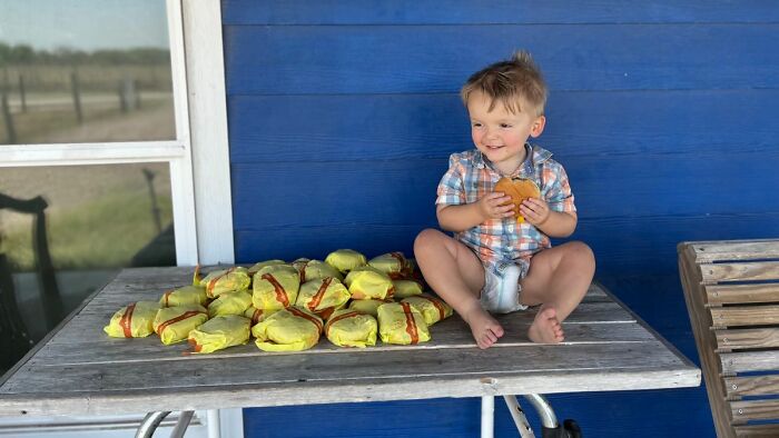 A 2 year old boy in Texas accidentally ordered 31 McDonalds cheese burgers from door dash while playing with his moms phone.