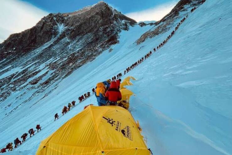 This is what the line to the summit of Mount Everest looks like: