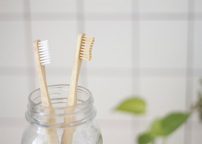 I learnt that we're supposed to brush both sides of our teeth . The inner side needs to be brushed as well.
I saw all of the commercials just showing them brushing the outer portion so i assumed that this is the way