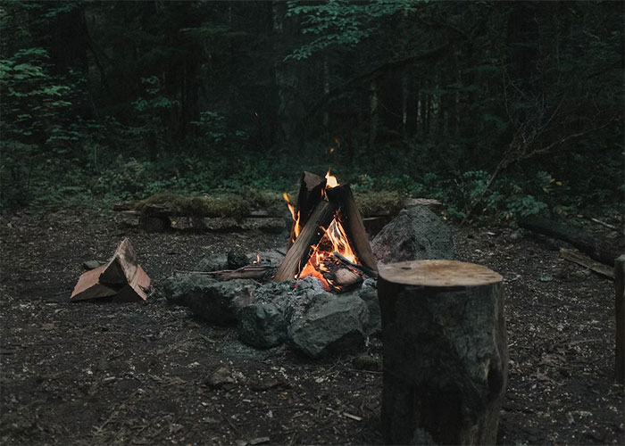 This happened last year. I was having a recurring dream where I was in the woods at night. I noticed a campfire in the distance. Whoever was sitting at the fire notices me and yells out "hey! What are you doing out here?" and starts moving towards me until I wake up. Late last summer I decided to go out to the woods for a hike. Once I got out there, I needed to pee. I hopped off of the trail to get closer to the creek so I could take care of business and not worry about anyone walking up on me. As I approached the creek, I see a hidden shelter and a man setting up a campfire. When he noticed me, he said "hey! What are you doing out here?" Nothing else happened. I apologized and went on my way. It was the only time in my life that I had dreams of an event before it happened. I was pretty shook at the time.