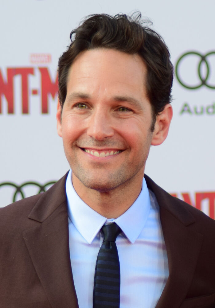 Paul Rudd. I was at a Decemberists concert, and in between opening acts, I headed to the women's bathrooms. Paul Rudd was standing outside of the bathroom, obviously waiting for someone. Do you ever have one of those moments where your mouth just says words without the permission of your brain? Yeah. As I passed by Paul Rudd, I did finger guns at him and said, "Hanging out in front of the women's bathroom? That's a good way to pick up women." and kept walking. I could hear him laughing as I entered the bathroom. I was torn between being pleased that I made him laugh and being mortified that I was such a dork. When I left the bathroom, he saw me and started laughing again, so I went over to him and said I had no idea why I said that. So we had a little laugh together, and had a nice little chat. He was a really nice guy, not even as a celebrity, just as a cool dude.

Although thinking back on it, no woman came out of the bathroom and came over to him while he was waiting, so I still don't know why he was hanging around outside of the bathrooms. Maybe he WAS picking up women.