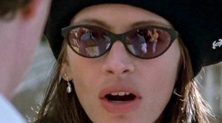 Notting Hill. In a scene where the main character bumps into Julia Roberts’ character, she looks up, and the reflection of the entire film crew is visible on her sunglasses.