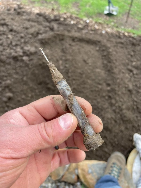 “12 yards of ‘supersoil’ delivered for the gardens. Found this in the second wheelbarrow.”