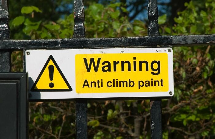 Anti-climb paint, a class of non-drying oil paint, was developed in the 1960s. It can take over 3 years to dry, It is used to prevent trespassing and mark trespassers as it is very difficult to remove.