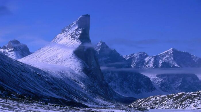 Mt. Thor on Baffin Island, Canada, has Earth’s greatest sheer vertical drop (4,101 feet).You can take one step off the peak and fall nearly a mile before you hit anything.