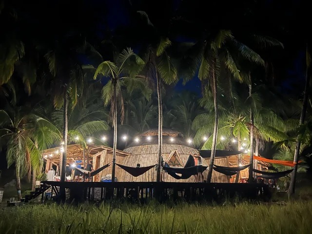 Bamboo dome house at night.