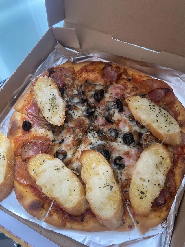 Asked for a pizza and some garlic bread and they gave me garlic bread pizza