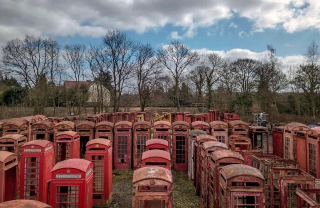 worn down by time - cemetery of phone booths