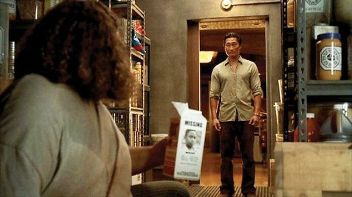 Lost, Season 2, Episode 4, Hurley Is Drinking Milk From A Carton He Found In The Hatch, With A Missing Child Photo Of Walt, Michael’s Son, Who Was Abducted In The Last Episode Of Season 1
