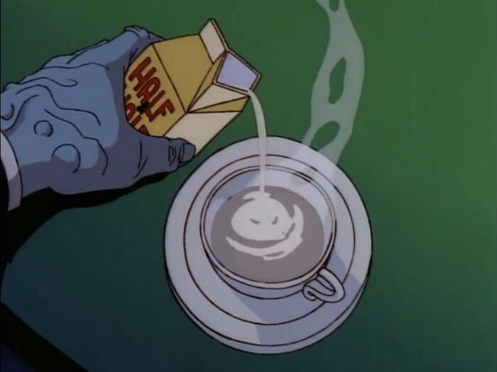 In S1e35 Of Batman: The Animated Series, The Villain “Two-Face” Is Seen Pouring Half And Half In His Coffee